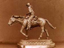 Rear view of "Against the Wind", a bronze by L.D. Edgar, Western Heritage Studio, Cody Wyoming.